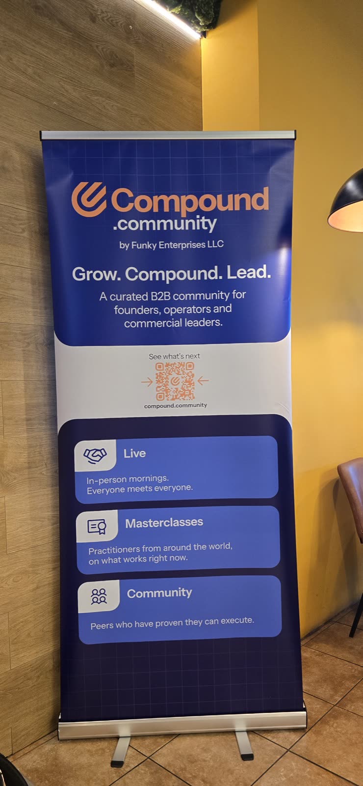 Compound banner beside the restaurant seating area